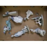 Two Lladro figurines, four Nao and one similar unmarked example.