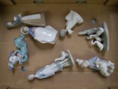 Two Lladro figurines, four Nao and one similar unmarked example.