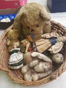 Small wicker vintage dogs basket containing Antique Teddy Bear and vintage dolls etc