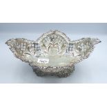 A Hallmarked sterling silver pierce work ornate footed bowl, 561.2g (requires small repair to bottom