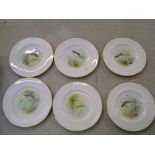 A set of 6 Wedgwood plates decorated with fish