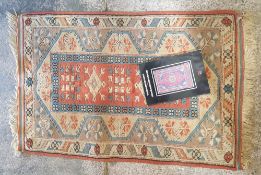 Turkish handwoven Ipek rug, 136cm x 83cm.