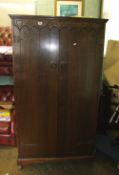 Oak 2 door gentlemans wardrobe on castors, 91cm W x 45cm D x 173cm H.