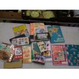 A mixed collection of items to include, stamp reference books, Chinese stamps and collectors
