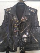 Vintage leather waistcoat with vintage pin badges