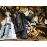 A collection of ceramic and resin figures to include resin owls, Lladro style figure etc (1 tray).