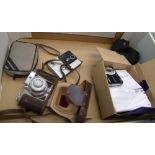 A group of photographic equipment to include Olympus X-15 with original box, cased Kodak disc 4000