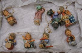 A collection of 8 Goebel Christmas tree decorations.