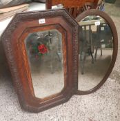 Two Oak framed Bevel edged Wall Mirrors one with floral detail