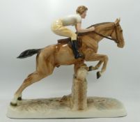 Hertwig Katzhutte Art Deco figure girl on light brown horse jumping fence, approx 27cm in length