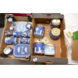 A large collection of Wedgwood Dip Blue & Adams Jasperware including biscuit barrels, jugs, dressing
