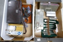A collection of vintage medical equipment to include Fukuda meter, surgicon steel boxes, Doctors