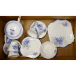 shelley china blue floral part teaset, comprising 4 cups and saucers, teapot (chip to spout) sugar