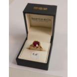 9ct gold hallmarked ring set large red stone , weight 4g, ring size R.