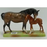 Beswick brown mare and chestnut foal on ceramic base 1811.
