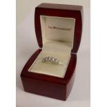 Gem Diamonds 5 stone ring set with white stones that are superior 'diamond copies', ring size S,