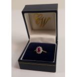 9ct hallmarked ruby (or similar coloured red gem stone) & diamond set cluster ring, weight 2.7g,