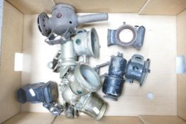 A collection of Veteran Motoring Lamps and lanterns including Lucas Motor Acetyphote lamp, cycle