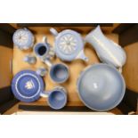 A collection of Wedgwood blue jasperware items, including Teapot, footed bowl, vases etc (10)