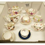 A collection of Coalport Floral Decorated Miniature Teapots, Tureens & cups and saucer sets