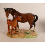 Beswick model of brown Mare and chestnut Foal 953, on ceramic grassy base together with similar