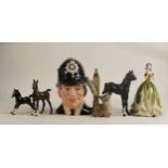 A mixed collection of items to include Beswick Foals, Royal Doulton seconds character jug &