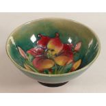 Moorcroft Spring Flowers on Green Ground Footed Bowl, height 7cm, tiny chip to rim