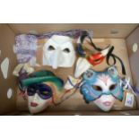 A collection of face masks: including two "Clay Art" face masks of ladys, Pulcinella and