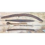 Antique Indigenous Aboriginal Weapons including: Boomerang with incised decoration (107cm drilled