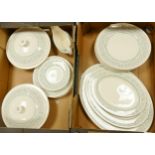 A collection of Royal Doulton Arabesque patterned dinner ware including platters, tureens, dinner