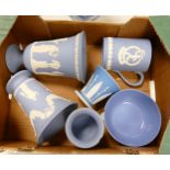 A collection of Wedgwood jasperware to include two flared vases, tankard, bowl (A/f), small vase (