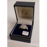 9ct gold hallmarked diamond set ring, weight 4.6g, ring size Q/R. Set with many diamonds and an