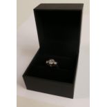 Gem Diamonds 3 stone ring set with white stones that are superior 'diamond copies', ring size Q,