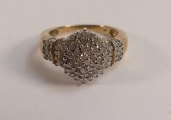 9ct hallmarked diamond set cluster ring, weight 5g, ring size R. Set with a large number of