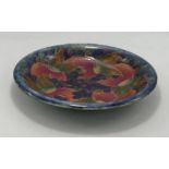 Early Moorcroft Pomegranate patterned shallow bowl, restored rim, diameter 23cm