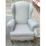 Victorian style wing back upholstered Armchair.