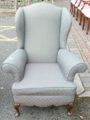 Victorian style wing back upholstered Armchair.