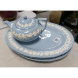 A collection of Wedgwood Queensware including large platters and teapot