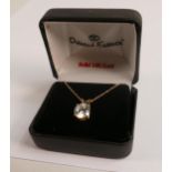 14ct gold pendant set large CZ or similar stone, looks just like a diamond, and 43cm long 14k chain.