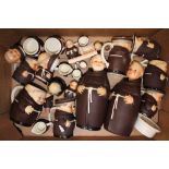 A collection of West German Monk novelty items to include small character jugs, storage jars, jugs
