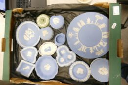 A collection of Wedgwood Jasperware including lidded boxes, pin trays, plates etc