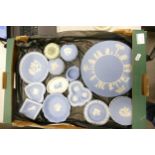 A collection of Wedgwood Jasperware including lidded boxes, pin trays, plates etc