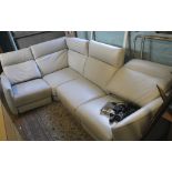 Modern corner sofa, in light grey leather, with phone charging points/USB, 18 months old approx,