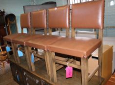 Set of 4 oak and leather dining chairs.