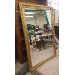 Very large modern gilt framed bevelled edge mirror, size 110cm x 170cm.