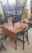 G Plan butterfly dining table and 4 chairs.