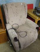 Fabric upholstered riser/recliner high-back armchair.