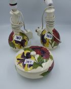 Moorcroft Hibiscus pair of lamp bases together with a lidded pot (chip to lid inner rim). Height