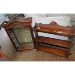 Wall hanging curio display cabinet together with a set of wall hanging open book shelves.