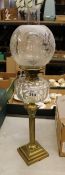 Edwardian brass and glass oil lamp with column shaped support, with chimney and shade, overall